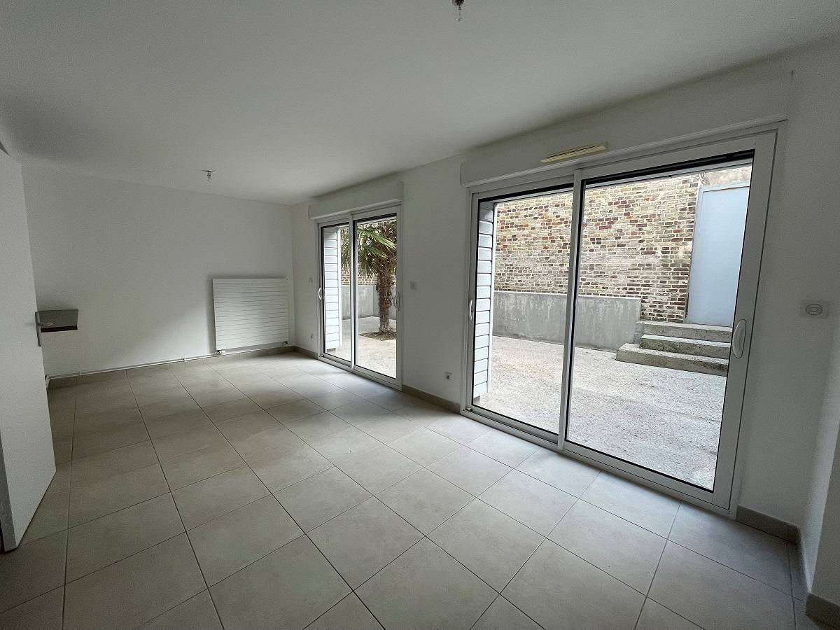 séjour cuisine ouverte accés terrasse